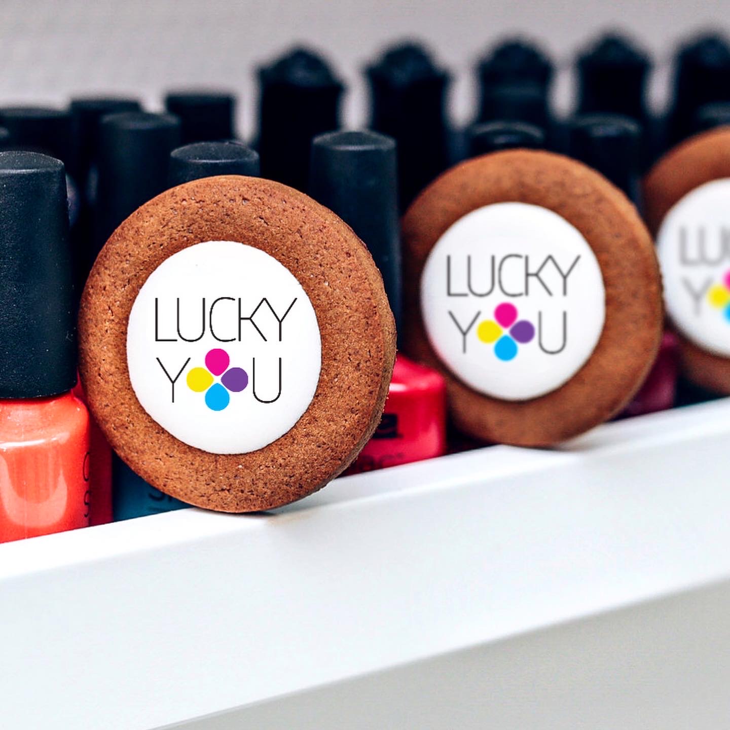 Logo placement. Brand strategy, visual identity and messaging platform for LUCKY YOU, nail salons.By Color.zone creative agency.